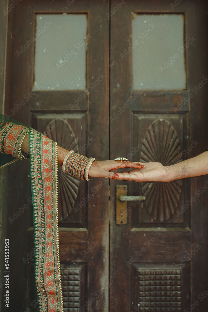 Indian Wedding Couple Holding Hands Stock Photo | Adobe Stock