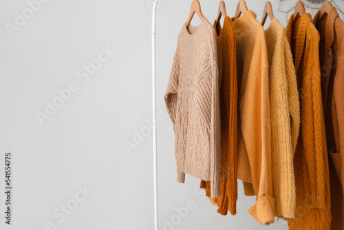 Rack with female warm sweat...