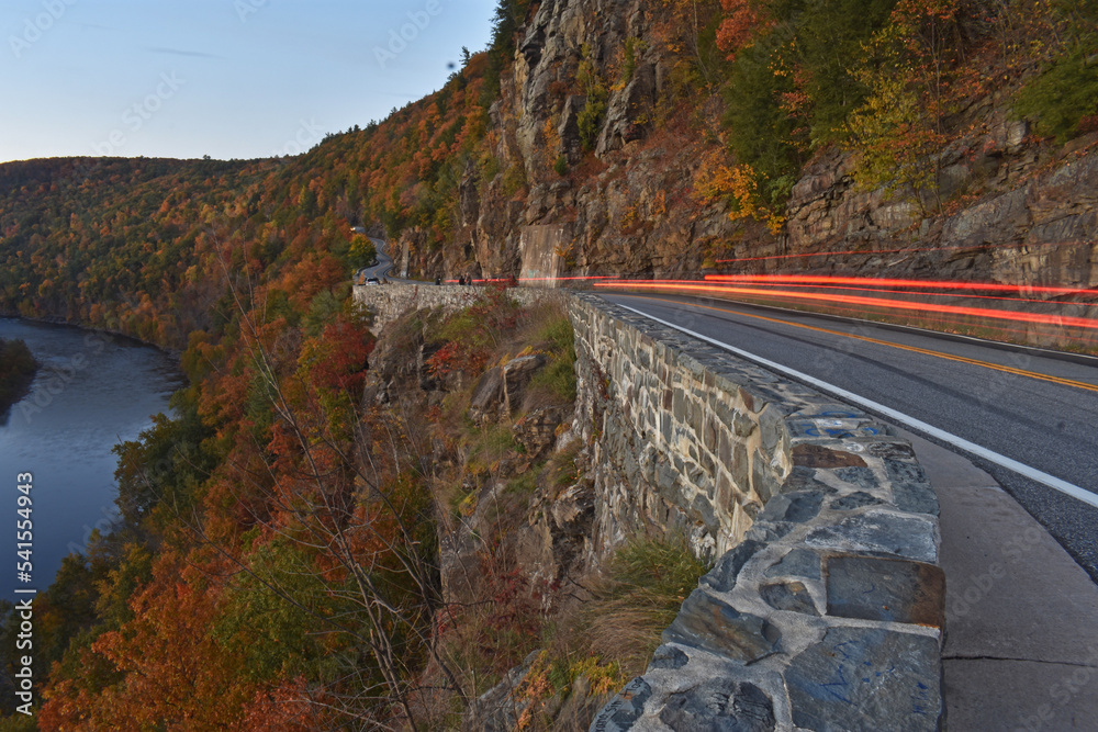 Light trails and colorful fall foliage in early evening at Hawk's Nest