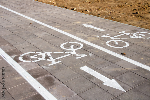 Marking of the bike path on the sidewalk photo