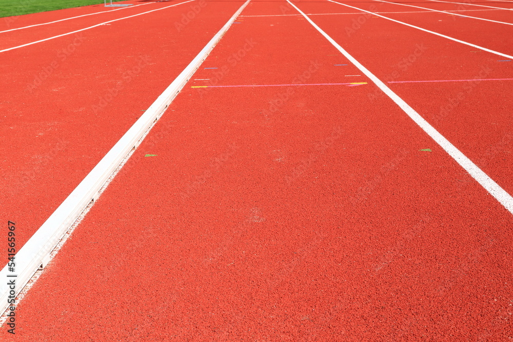 Track lines for running at a Stadium. Empty. One summer day. Bålsta, Stockholm, Sweden. Track lines for running at a Stadium. Empty. One summer day. Bålsta, Stockholm, Sweden.