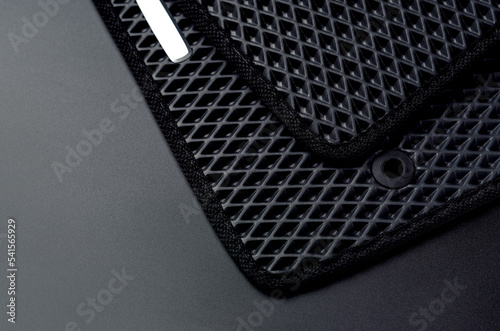 Fotografiet New black car mats made from eva ethylene vinyl acetate