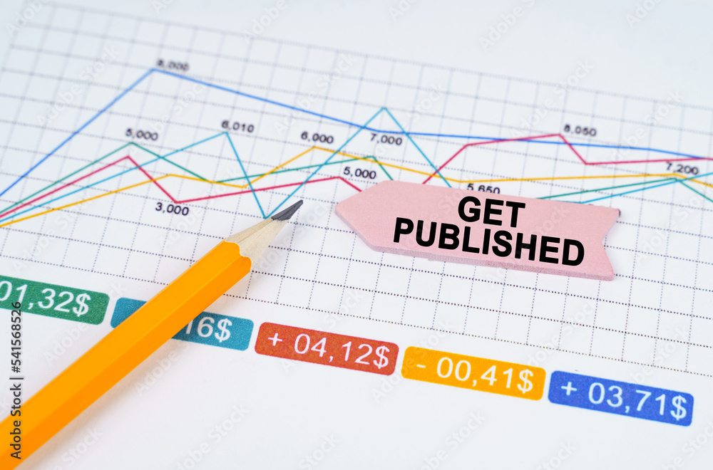 On business charts there is a pencil and an arrow sticker with the inscription - Get Published On business charts there is a pencil and an arrow sticker with the inscription - Get Published