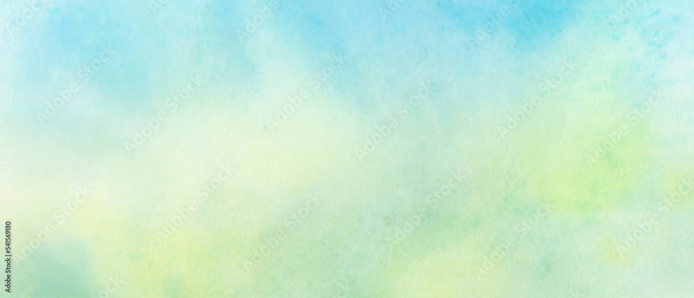 Green watercolor background for design. Abstract yellow and green spots blurred by water.