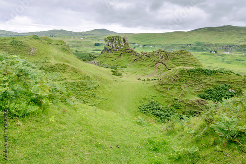 Castle Ewan covered in tourists,at the busy Fairy Glen,summertime,near Uig. photo