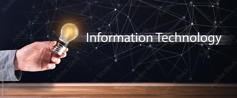 Fototapeta premium Information technology and light bulb in hand