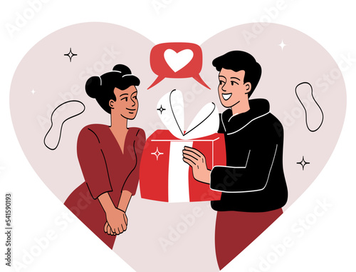 Man giving gift to woman