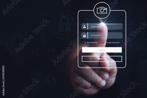 Concept of cyber security, login, password, information security and encryption, Man using login interface on touch screen. Touching login box, user name and password inputs on virtual display.
