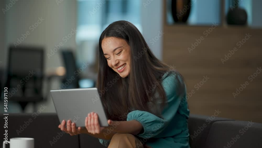 Laughing girl chatting computer taking break at lounge. Ceo having good mood Laughing girl chatting computer taking break at lounge. Ceo having good mood