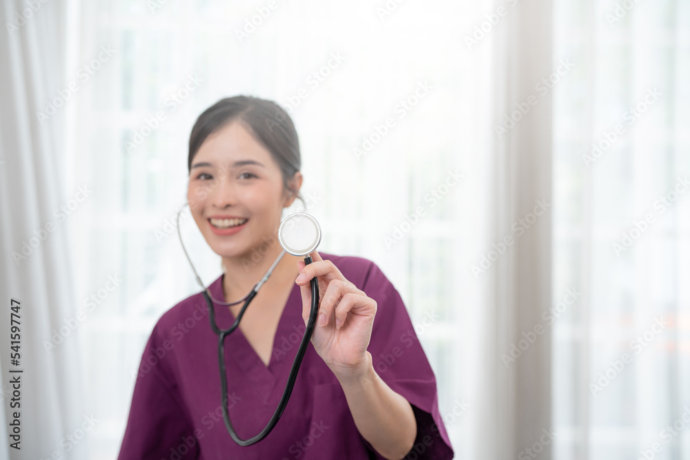 Portrait of asian young doctor using stethoscope in hospital. Portrait of asian young doctor using stethoscope in hospital.