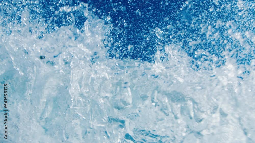 Ocean wave rolls and breaks. Atlantic Ocean's powerful wave breaks on the coast at sunny day Ocean wave rolls and breaks. Atlantic Ocean's powerful wave breaks on the coast at sunny day