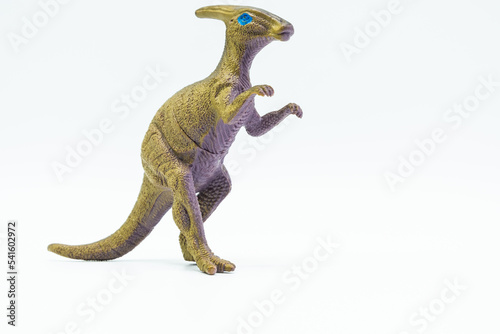 Plastic Parasaurolophus dinosaur toy on white background