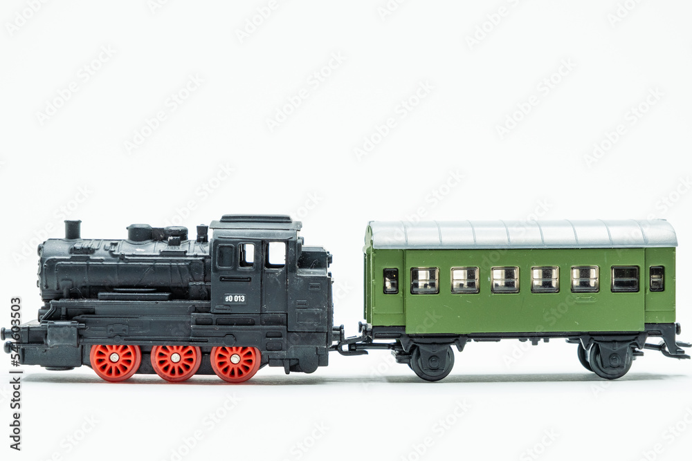 Obraz premium Old vintage train toy locomotive and wagon