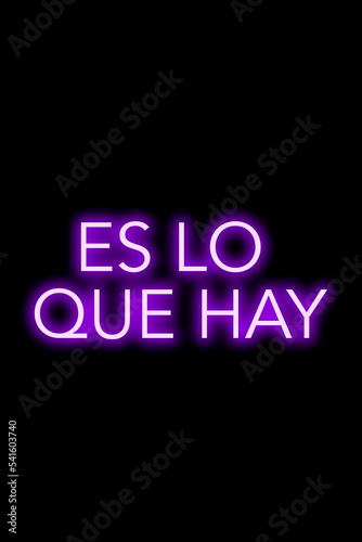 High quality illustration. Purple neon sign on a dark isolated background with the phrase it is what it is. Bright sign for designs or graphic resources