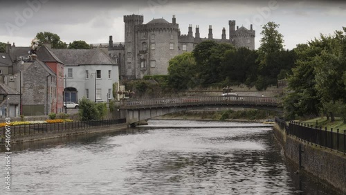 Distant bridge over river near Kilkenny Castle / Kilkenny, Kilkenny, Ireland