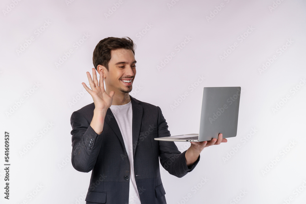 Portrait of young handsome smiling businessman video call via laptop in hands, isolated on white background Portrait of young handsome smiling businessman video call via laptop in hands, isolated on white background