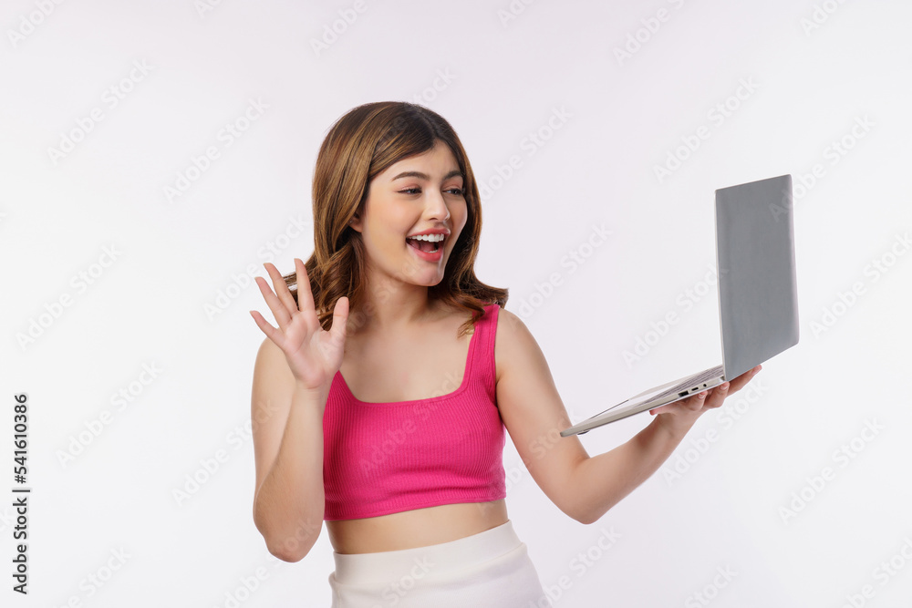 Fototapeta premium Portrait of young woman video call with laptop computer isolated over white background