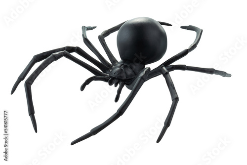 Foto Fake rubber spider toy isolated over a white background
