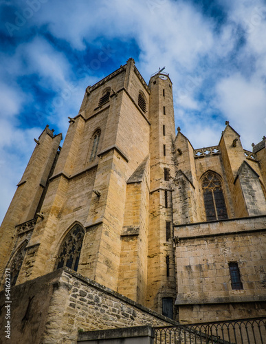 View on the gothic Saint Etienne collegiate church in the village of Capestang in the south of France (Herault)