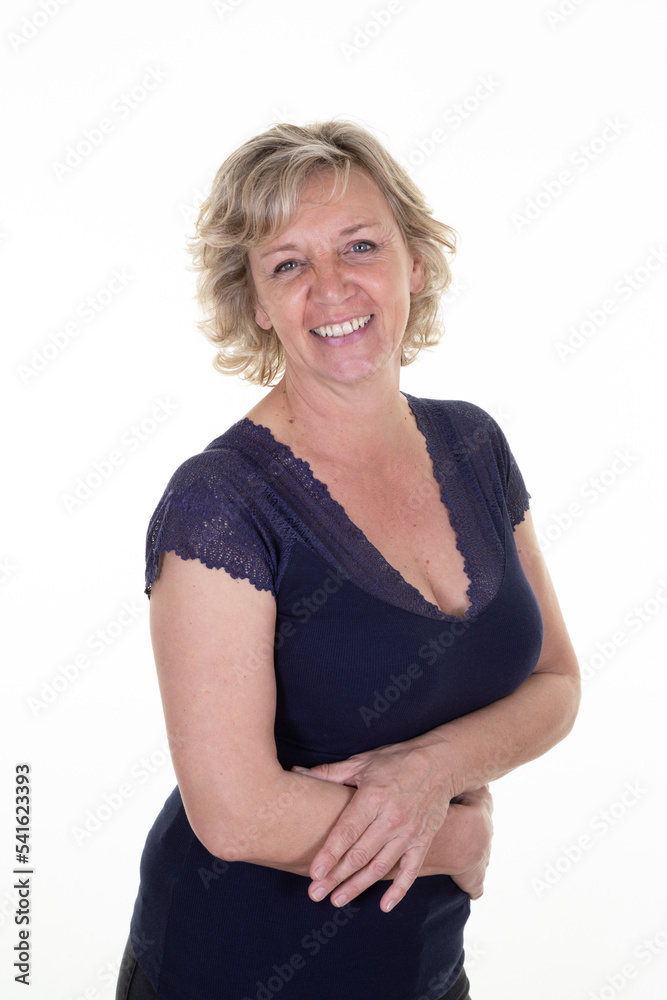 Attractive middle aged woman mature blonde with folded arms on white background Attractive middle aged woman mature blonde with folded arms on white background