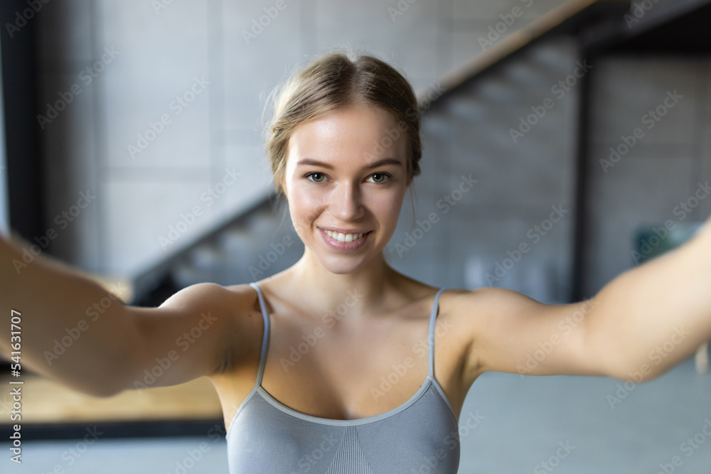 Active athlete woman have end of aerobics intense practice want take selfie in house Active athlete woman have end of aerobics intense practice want take selfie in house