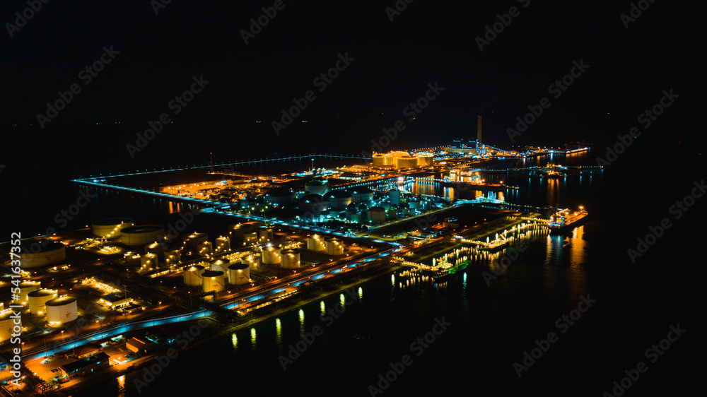 Aerial view oil tanker. Oil loading dock of business logistic sea going ship, Crude oil tanker lpg ngv at night. Group Oil tanker ship to Port of Singapore - Cargo ship import export