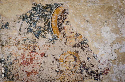 Dettaglio dell'affresco raffigurante una Madonna col bambino nell'abside della basilica bizantina su un lato della Chiesa dell'Annunziata a Castro, borgo del Salento in Puglia photo