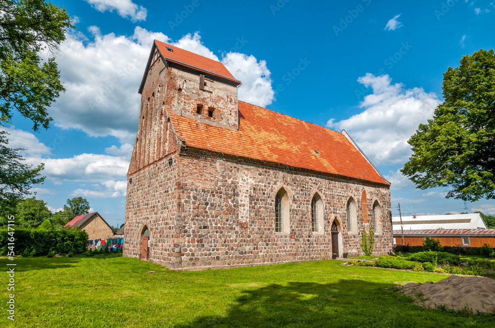 Catholic church St. Antoni of Padua in Buk, West Pomeranian voivodeship, Poland.The church was erected in the 13th century from a granite square in the Romanesque style. 