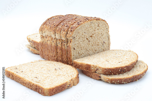 sliced ​​wholemeal bread, on white background. Concept of healthy food, balanced breakfasts, fiber foods.