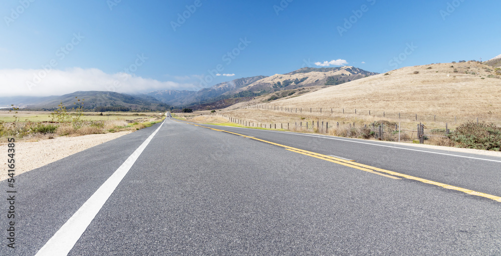 Naklejka premium Asphalt road and countryside landscape