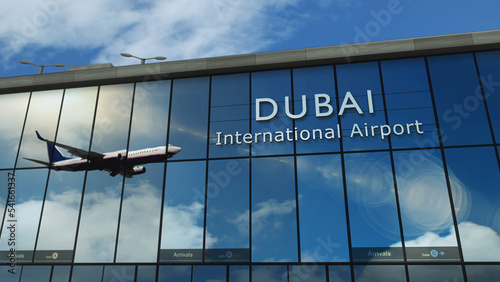 Canvas Print Airplane landing at Dubai United Arab Emirates airport mirrored in terminal