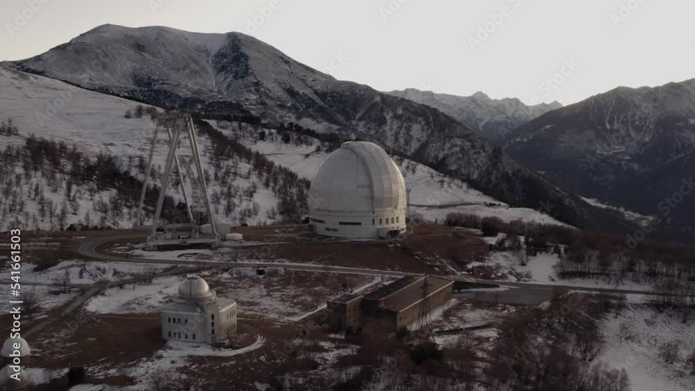 Fly around the space observatory on top of the mountain Fly around the space observatory on top of the mountain