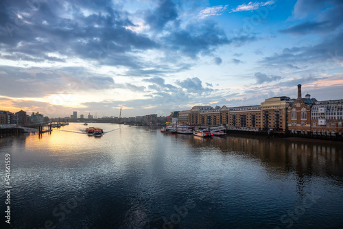 View of River Thames and City Skyline during dramatic sunrise. City of London  United Kingdom. Travel Destination