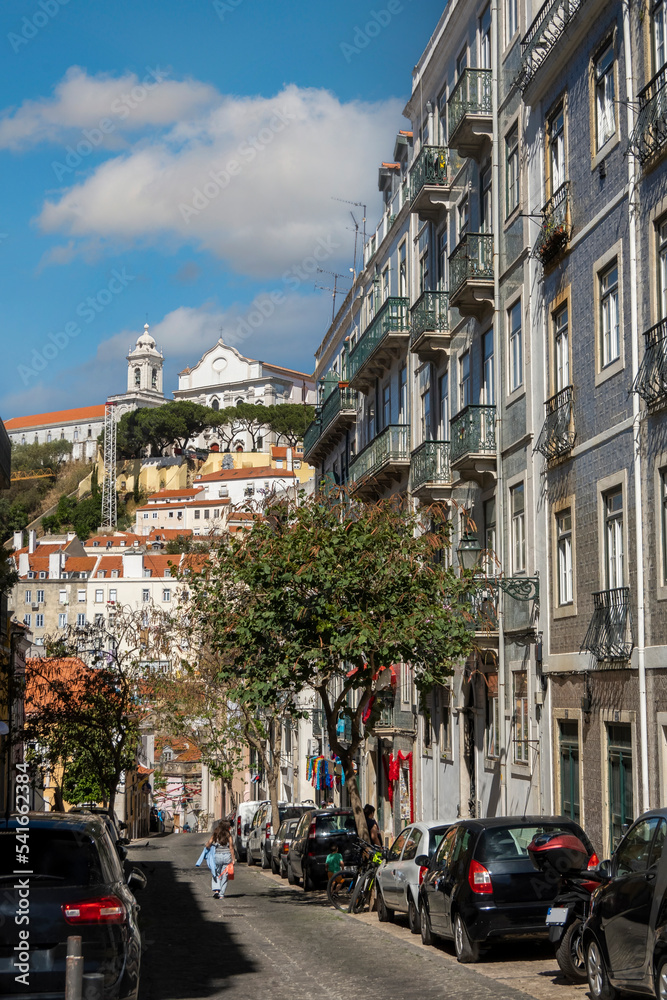 People visit the Mouraria district in Lisbon