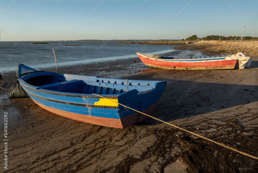 Old wooden fishing boats near palaphitic docks Old wooden fishing boats near palaphitic docks