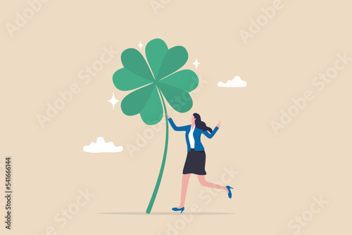 Fototapet Luck for success, blessing for work opportunity, fortune or chance, good luck or happiness concept, lucky businesswoman with crossed finger gesture holding lucky clover leaf