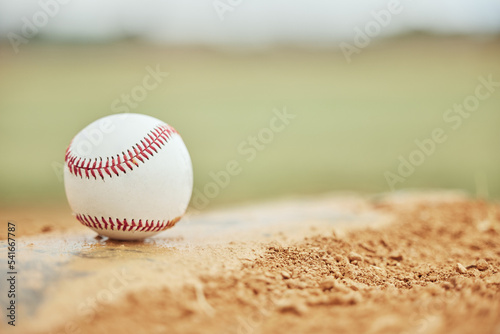 Baseball closeup, field and sports training outdoors for fitness, sport health and competition game. Athletic exercise equipment, softball motivation and match or baseball field bokeh background photo