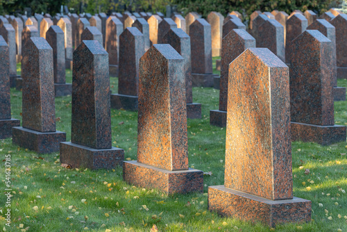 empty stone tombstone in a military cemetery. photo