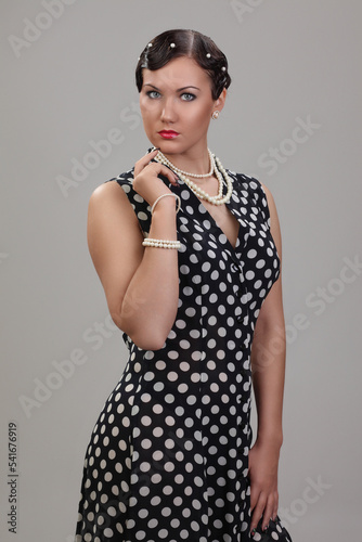 woman in polka dot dress