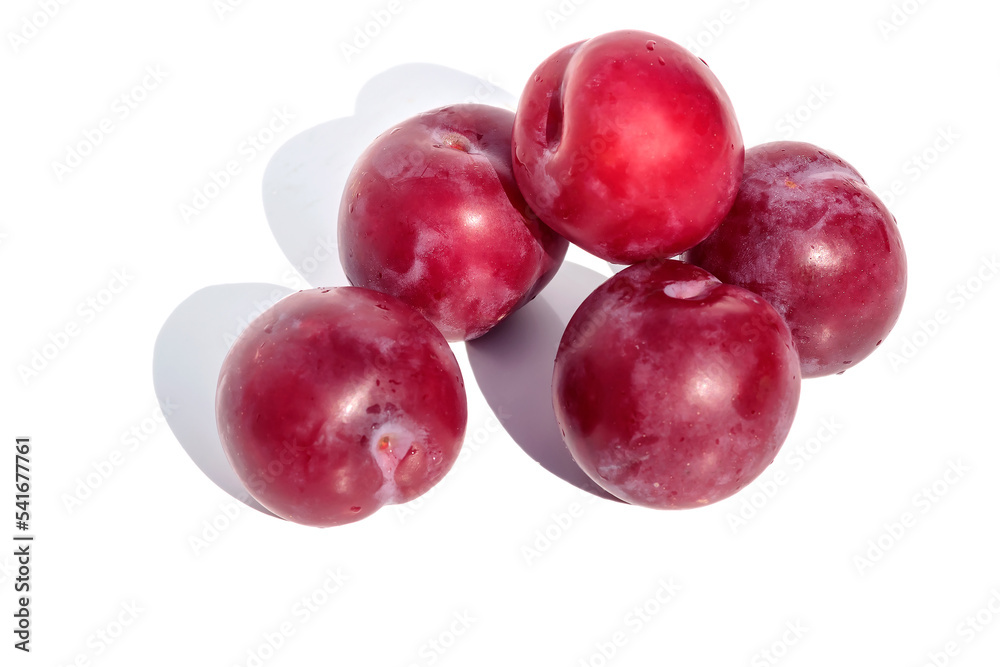 On a white isolated background red ripe tasty cherry plum. On a white isolated background red ripe tasty cherry plum.