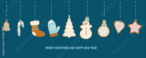 New Year's card. Hanging Christmas tree toys in the form of ginger cookies. Happy New Year and Christmas. Vector illustration isolated on a blue background.