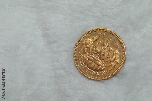 Golden coins of Goddess Lakshmi, Laxmi for Dhanteras puja diwali festival photo