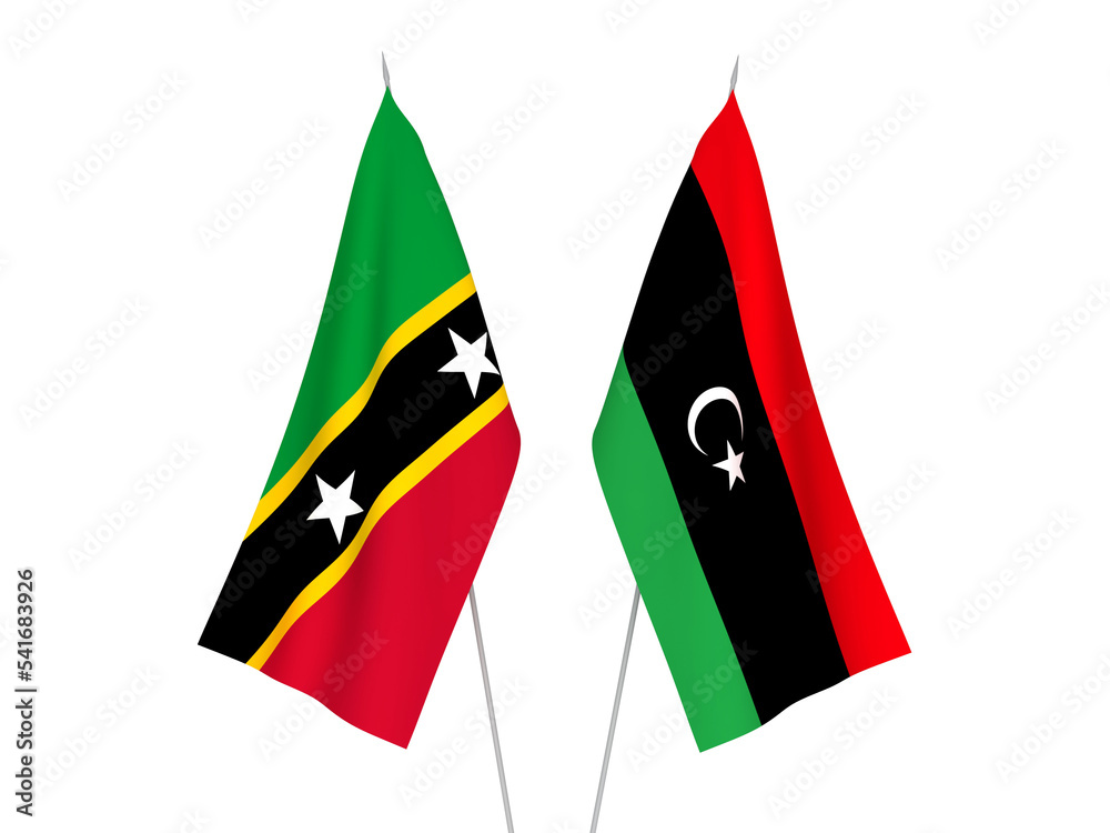 National fabric flags of Libya and Federation of Saint Christopher and Nevis isolated on white background. 3d rendering illustration.