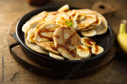 Homemade banana pancakes with caramel sauce