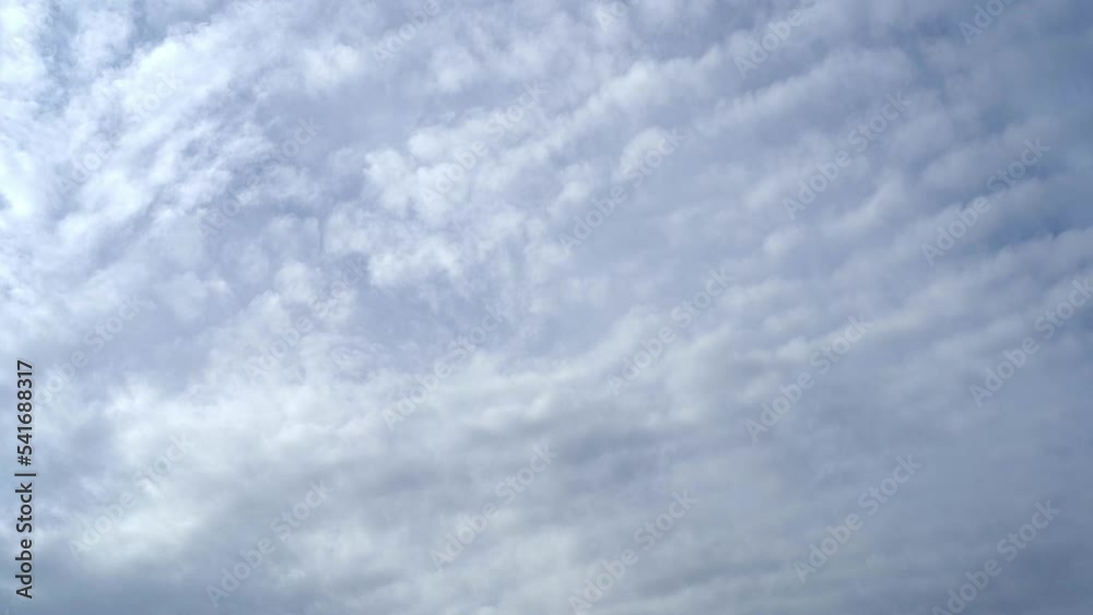 Altocumulus clouds moving across the sky in fast forward. Cloudy Sky. Cloudscape. Various layers of clouds move in different directions at altitude. 4k footage. Altocumulus clouds moving across the sky in fast forward. Cloudy Sky. Cloudscape. Various layers of clouds move in different directions at altitude. 4k footage.