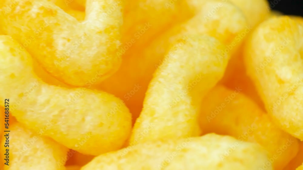 Macro video of spinning air crispy corn chips Macro video of spinning air crispy corn chips