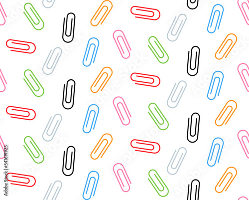 Seamless vector texture made of colorful paperclips on white