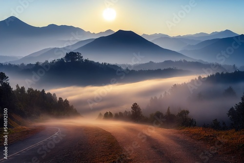 Leinwand Poster Foggy autumn mountain road in sunset or sunrise