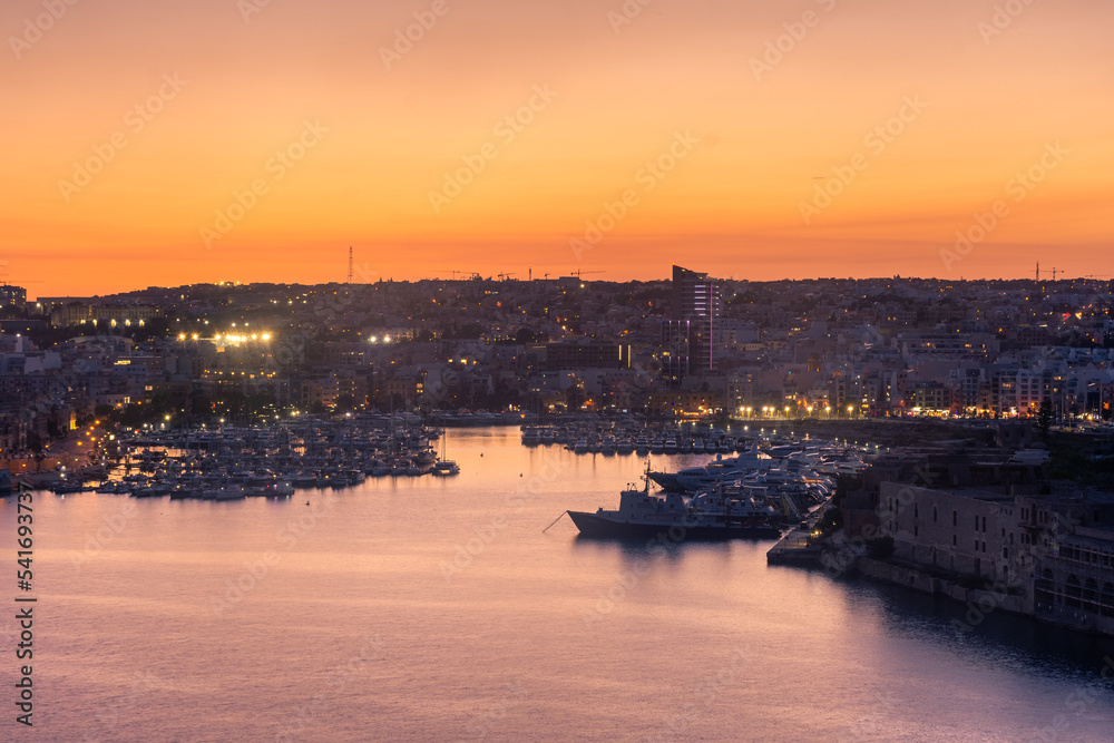 Beautiful sunset over the bay of  Valletta, Malta