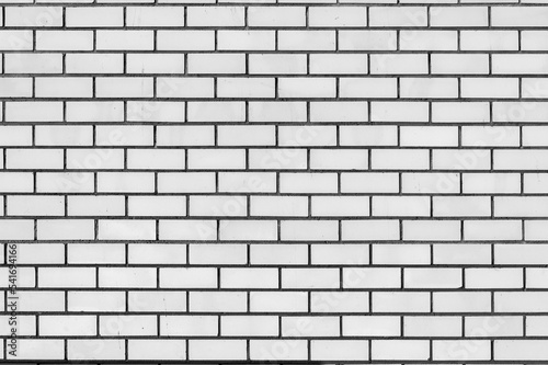 White brick wall texture for background usage as a backdrop design.